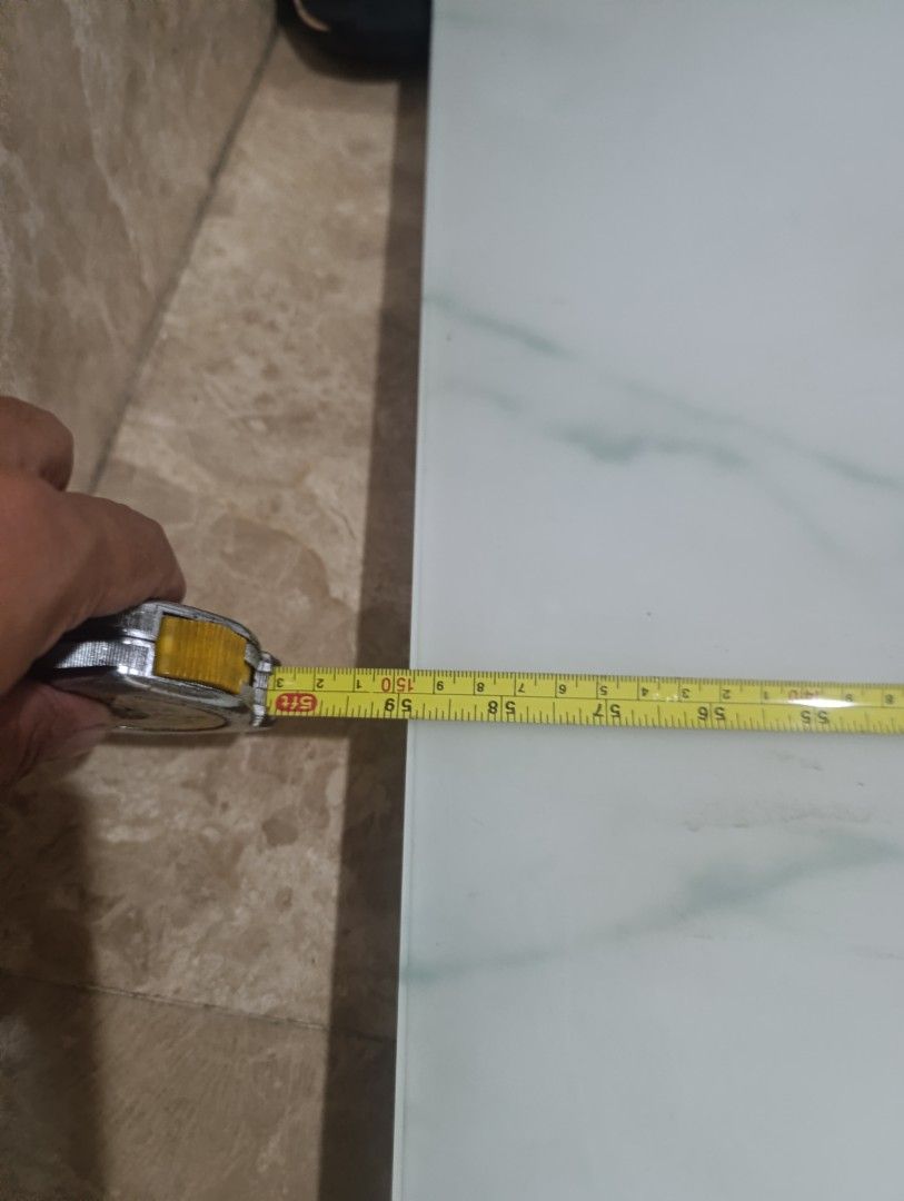 Faux marble glass table top replacement (Category: Tables & Sets) located in Quezon City. Submitted by kuruma_13 (Listing ID 1467245154, Image 3). Description: - Product: Rectangular glass table top - Design: White and green faux marble pattern - Dimensions: Approx. 82 cm x 59 cm. pls check - Features: Heavy glass material with fou circular corner mounts - Condition: Good overall, with minor discoloration marks and spots near the corners - Ideal 
