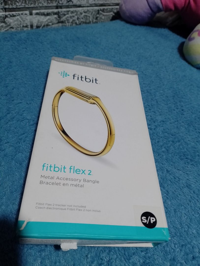 Fitbit Flex 2 Metal Accessory Bangle Gold Size S (Category: Bracelets) located in Manila. Submitted by delosoryan29536 (Listing ID 1467238777, Image 1). Description: - Item: Official Fitbit Flex 2 Gold Stainless Steel Bangle - Size: Small - Inclusions: Original packaging box and soft pouch - Note: Tracker unit NOT included.