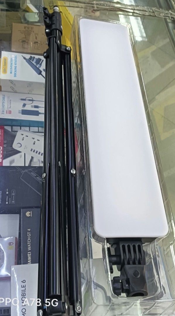 Flat Panel Fill Light RL-14 with Tripod Stand (Category: Lighting & Studio Equipment) located in Manila. Submitted by iliasjen3082126 (Listing ID 1467205256, Image 3). Description: - Model: RL-14 Flat Panel Fill Light - Bright rectangular white LED panel for optimal illumination - Includes adjustable black tripod stand, power cord, and manual - Ideal for video calls, live streaming, and content creation - Comes in its original retail box - Meetup