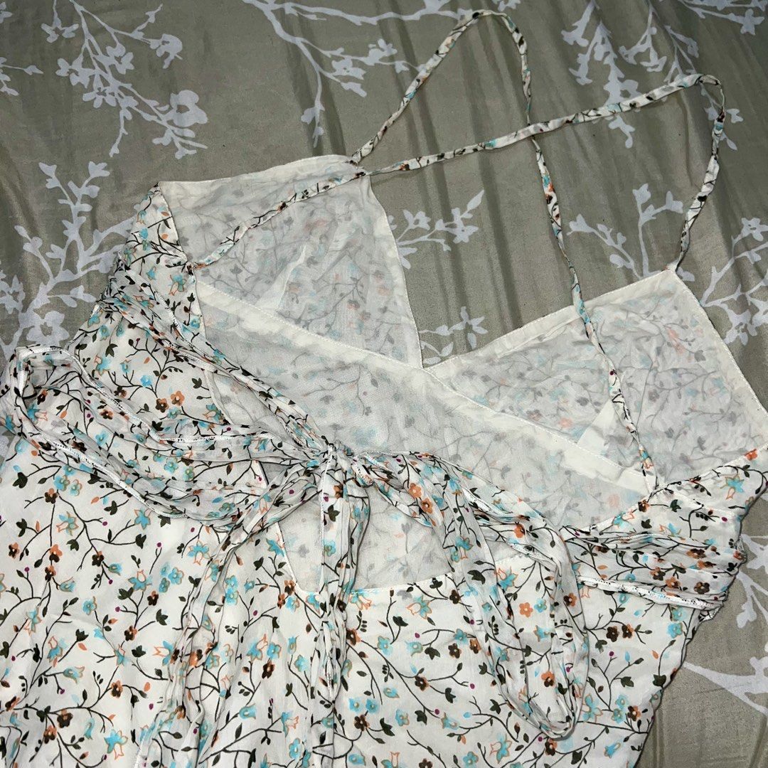 Floral Print Halter Backless Dress (Category: Dresses) located in Marikina City. Submitted by prelovedbydee. (Listing ID 1467351899, Image 3). Description: - closure: tie-back - hem: asymmetrical with light ruffles - fabric: lightweight (cotton/silk) can negotiate ☺️.
