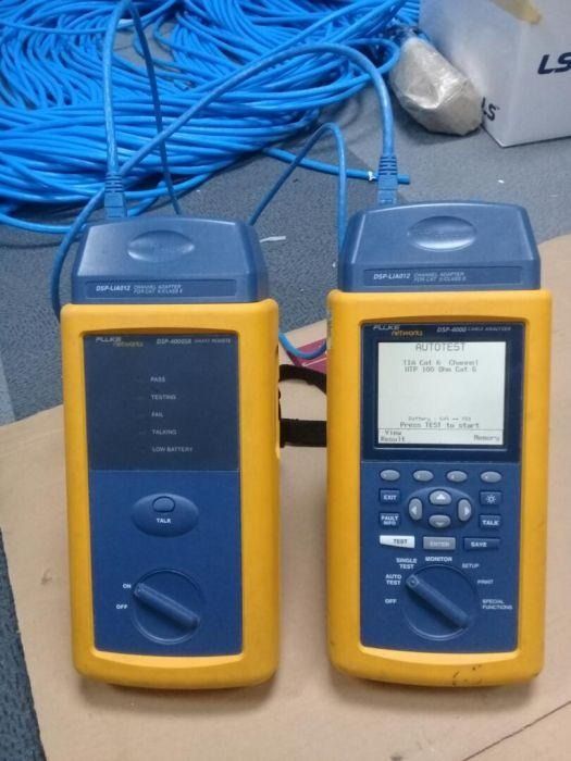 Fluke Testing (Category: Office & Business Technology) located in Quezon City. Submitted by janesse (Listing ID 1467305274, Image 2). Description: - Tested and working Fluke Networks DSP-4000 cable analyzer - Includes smart remote unit and Cat 6 channel adapters - Clear display showing pass results - Physical wear on yellow protective rubber casing from regular fieldwork - Strap included for easy transport - Reliable industrial testing equipment 