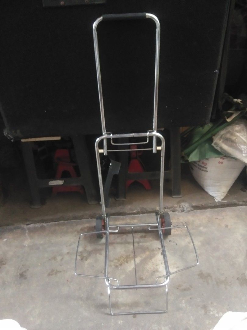 Foldable metal trolley (Category: Luggage) located in Caloocan City. Submitted by lolaCecille (Listing ID 1467359867, Image 1). Description: heavy duty, big metals, chrome finish, from surplus .