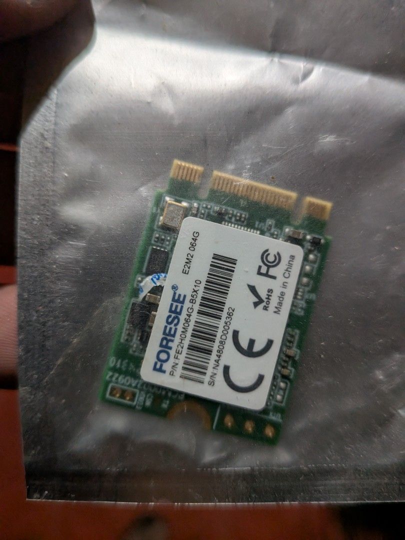 FORESEE E2M2 064G M.2 SSD 64GB (Category: Hard Disks & Thumbdrives) located in San Jacinto. Submitted by jigssaw (Listing ID 1467302167, Image 2). Description: - Brand: FORESEE E2M2 064G SSD - Capacity: 64GB storage - Part Number: FE2H0M064G-B5X10 - Serial Number: NA4808D005362 - Condition: Brand new, sealed in original anti-static shielding bag - Certifications: CE and FCC certified - Origin: Made in China.