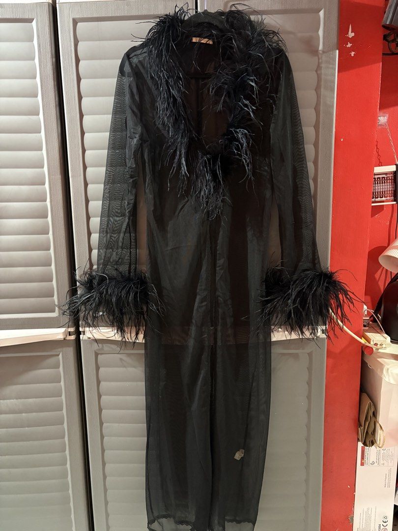 Forever21 Black Feather Trim Sheer Mesh Maxi Robe (Category: Dresses) located in Manila. Submitted by kindledph_ (Listing ID 1467169826, Image 2). Description: Size: S-Semi large - Brand: Forever 21 - Color: Black - Material: Sheer mesh, lightweight and flowy maxi length - Details: Fluffy feather cuffs and collar trim - Condition: Worn once for a photoshoot, zero flaws - Styling: Great statement piece to wear over a bodysuit or lingerie Used once