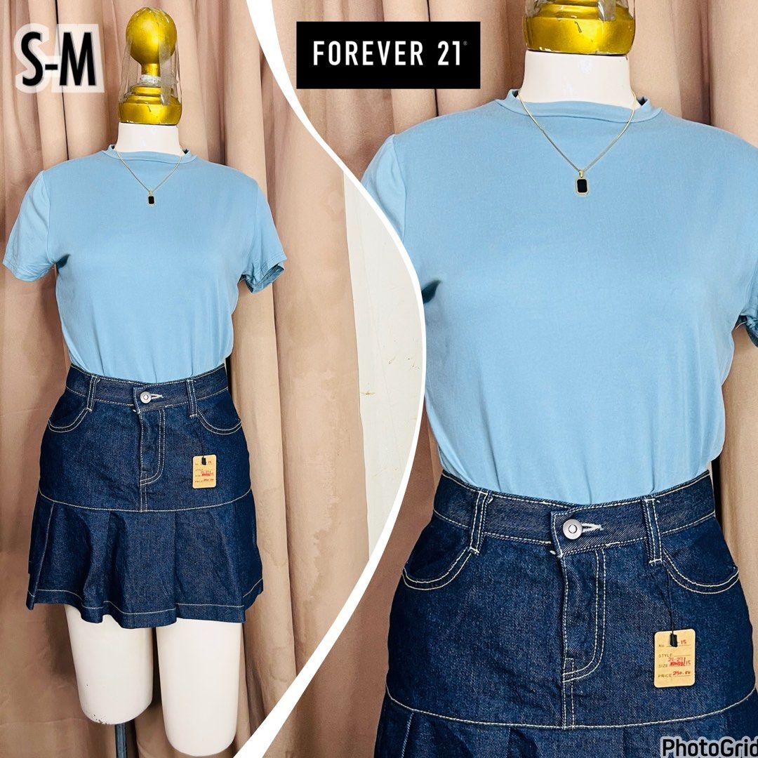 Forever 21 Blue Top (Category: Blouses) located in Manila. Submitted by bengirlclothing (Listing ID 1467326284, Image 1). Description: - Light blue mock neck top - Effortless casual look for daily wear - Fits small to medium frames comfortably.