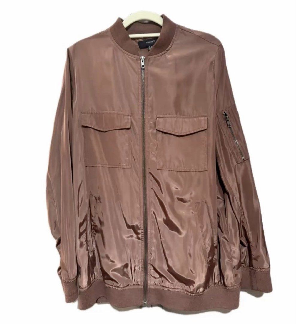 Forever 21 Rust Rose Gold Bomber Jacket (Category: Coats, Jackets and Outerwear) located in Antipolo. Submitted by nyeahsells (Listing ID 1467186847, Image 1). Description: Pre-loved Size: L Color: Rust/Rose Gold Flaw: None RFS: decluttering Disclaimer: - All sales final (NO RETURN, NO EXCHANGE) - Our shop will not be liable for any damages due to mishandling by the courier - Please manage expectations - First to pay gets the item (NO RESERVATION