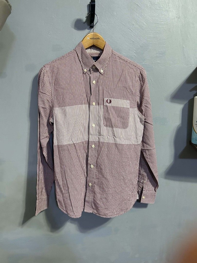 Fred Perry Long Sleeve Button Down Shirt Maroon Gingham (Category: Formal Shirts) located in Manila. Submitted by marjoriete27817 (Listing ID 1467192717, Image 1). Description: - Brand: Fred Perry - Style: Long sleeve button-down shirt with buttoned collar -size small 19*28 - Pattern: Burgundy & white gingham check with vertical striped chest panel - Details: Chest pocket and signature embroidered laurel wreath logo - Origin: Made in China - Prod