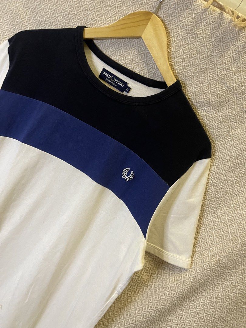 Fred perry tritone tee (Category: Tshirts & Polo Shirts ) located in Manila. Submitted by hypestock_mnl (Listing ID 1467187994, Image 2). Description: - stylish - perfect for casual wear - great fit - in good condition - minimal signs of usage - 9/10 - money worth! -need wsh - see pics for details/issue.
