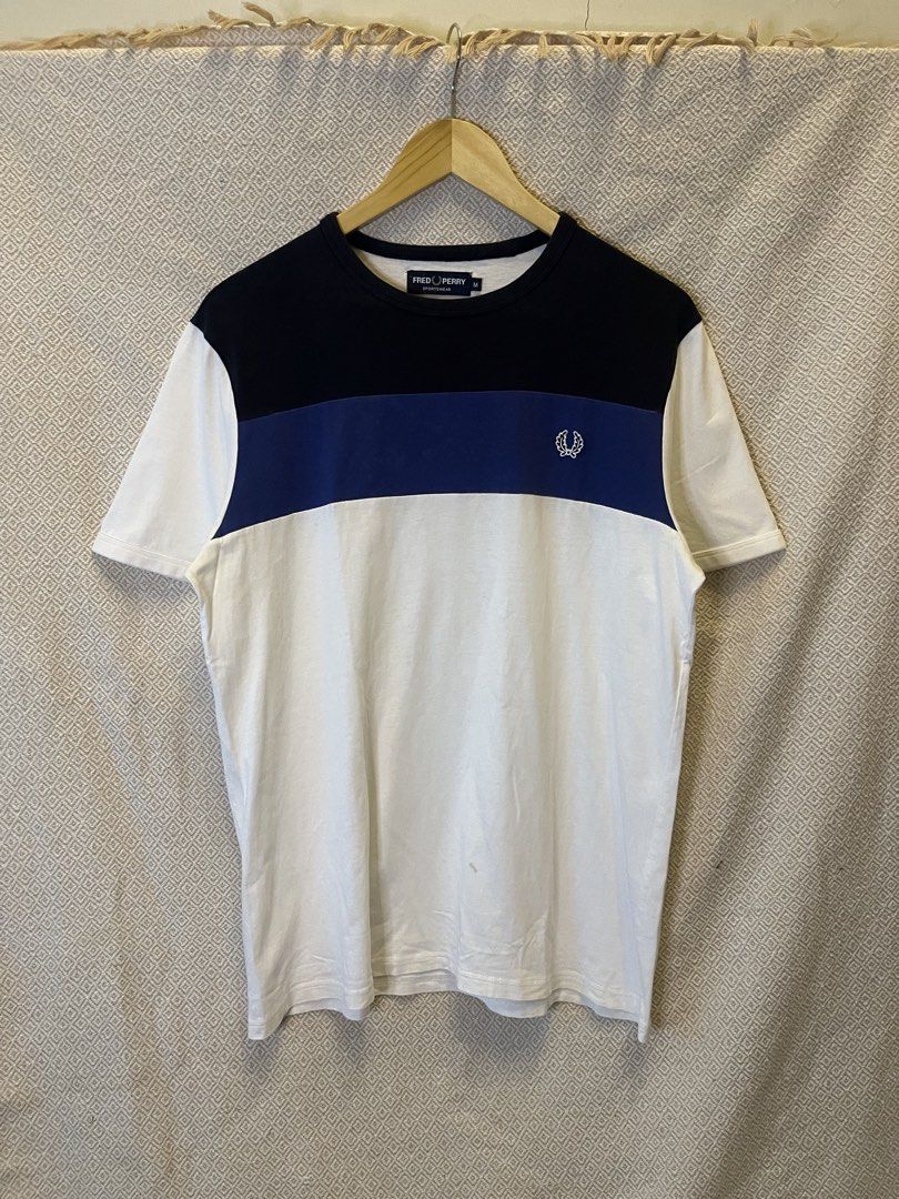 Fred perry tritone tee (Category: Tshirts & Polo Shirts ) located in Manila. Submitted by hypestock_mnl (Listing ID 1467187994, Image 1). Description: - stylish - perfect for casual wear - great fit - in good condition - minimal signs of usage - 9/10 - money worth! -need wsh - see pics for details/issue.