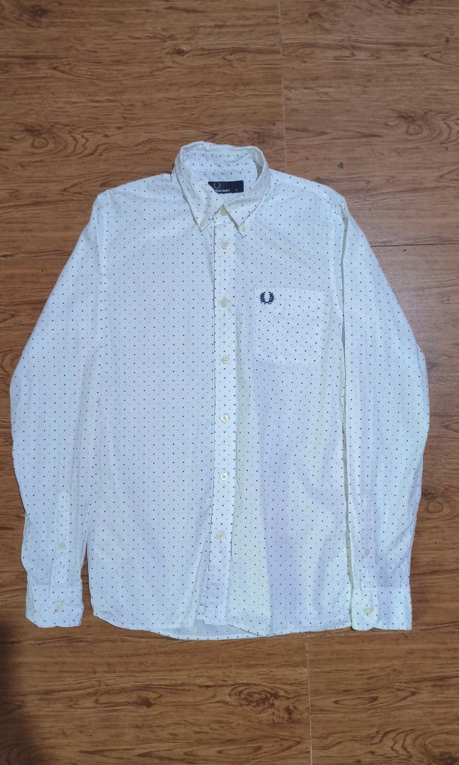 Fred Perry with pocket Polka dots long sleeves (Category: Formal Shirts) located in Toledo. Submitted by thejosepharchiveonig (Listing ID 1467224900, Image 1). Description: 19W | 28L issue: stains see last pics needs wash lang tan.