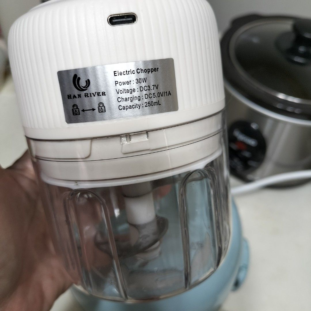 Free defective rechargeable Chopper 250ml (Category: Juicers, Blenders & Grinders) located in Paranaque City. Submitted by decluttering-all (Listing ID 1467170478, Image 3). Description: - Brand: Han River - Capacity: 250ml - Power: 30W, USB rechargeable - Condition: Complete with original box, USB charging cable, and instruction manual - Features: Super compact, easy to store, and perfect for chopping garlic, onions, and small prep tasks recentl