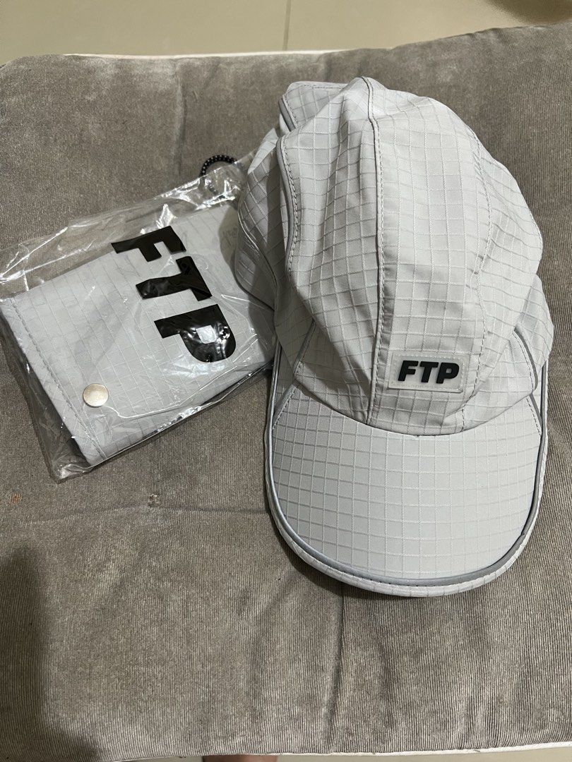 FTP Piping Ripstop Facemask Runner Hat (Category: Caps & Hats) located in Bacolod City. Submitted by ghostgiiirl___ (Listing ID 1467308944, Image 1). Description: - Brand: FTP - Item: Piping Ripstop Facemask Runner Hat - Color: Grey - Material: 100% nylon - Condition: Brand new, crisp, never worn out - Features: Adjustable bungee cord closure at the back - Inclusion: Matching detachable face mask (still stored inside original packaging bag).