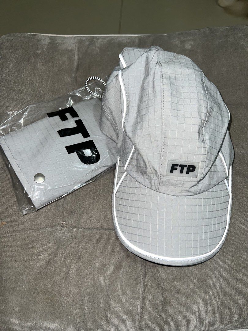 FTP Piping Ripstop Facemask Runner Hat (Category: Caps & Hats) located in Bacolod City. Submitted by ghostgiiirl___ (Listing ID 1467308944, Image 2). Description: - Brand: FTP - Item: Piping Ripstop Facemask Runner Hat - Color: Grey - Material: 100% nylon - Condition: Brand new, crisp, never worn out - Features: Adjustable bungee cord closure at the back - Inclusion: Matching detachable face mask (still stored inside original packaging bag).