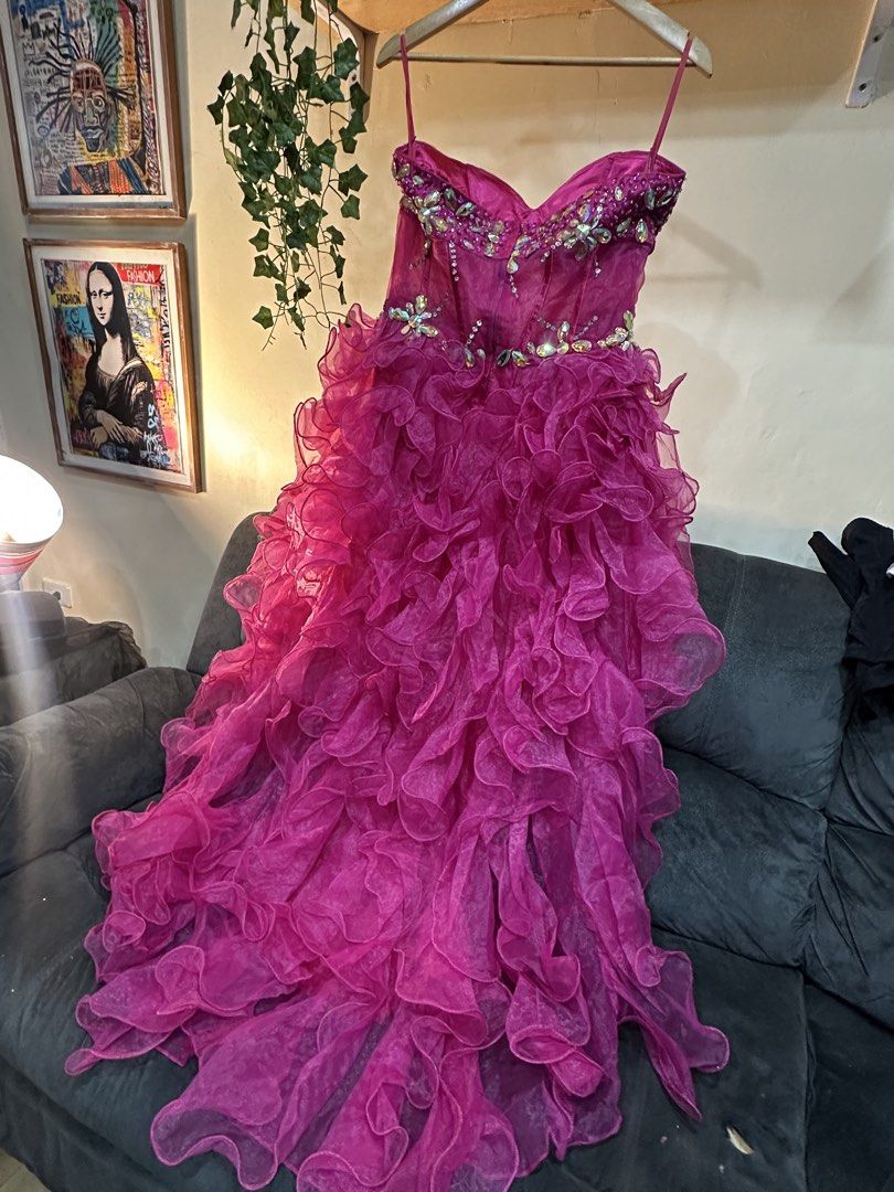 Fuchsia Rhinestone Prom Dress With Ruffles (Category: Evening dresses & gowns) located in Manila. Submitted by tenshiii185 (Listing ID 1467248799, Image 3). Description: - Color: Vibrant fuchsia pink - Design: Strapless with thin spaghetti straps, sweetheart bodice, and waistline heavily embellished with rhinestones - Skirt: Satin base with high-low, voluminous cascading ruffled tulle layers - Closure: Back zipper - Condition: Worn only once, pro