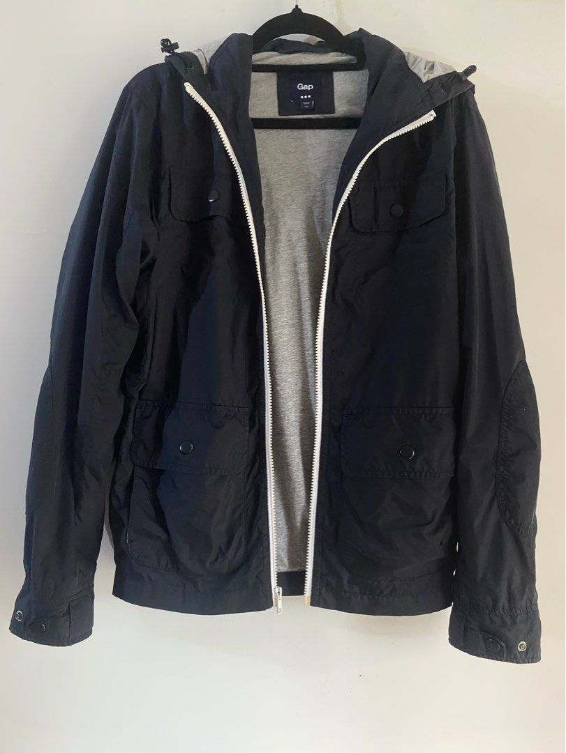 GAP Black Nylon Rain Jacket (XS) (Category: Coats, Jackets and Outerwear) located in Quezon City. Submitted by shopmariascloset_ (Listing ID 1457280188, Image 1). Description: GAP Black Nylon Rain Jacket (XS) Unisex 24 in. x 15.5 in Loc: San Benissa Garden Villas, Quezon City.