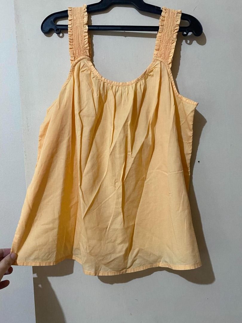 GAP Yellow Sleeveless Top (Category: Blouses) located in Muntinlupa City. Submitted by aubreyraven (Listing ID 1467208823, Image 1). Description: Used once.