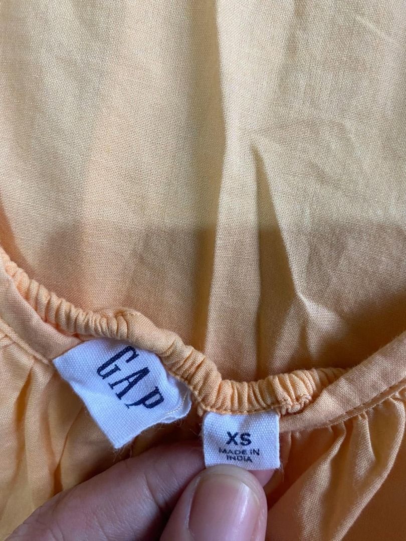 GAP Yellow Sleeveless Top (Category: Blouses) located in Muntinlupa City. Submitted by aubreyraven (Listing ID 1467208823, Image 2). Description: Used once.