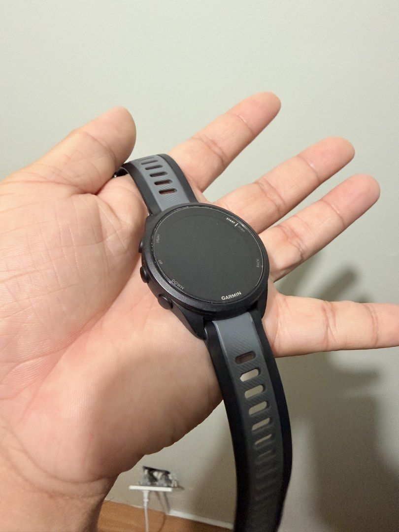 Garmin Forerunner 165 (Category: Wearables & Smart Watches) located in Angeles City. Submitted by engrjaydee (Listing ID 1467171696, Image 2). Description: - Brand/Model: Garmin Forerunner 165 GPS Running Smartwatch - Color: Black and Gray - Condition: Excellent pre-owned condition - Included: Smartwatch, original box, and charging cable - Features: Vibrant AMOLED display, advanced running and health tracking metrics - Meetup Locations: McDonald'