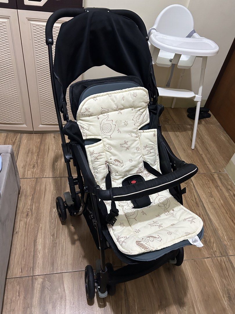 Giant Carrier Black Stroller (Category: Strollers) located in Manila. Submitted by declutteringkz (Listing ID 1467170204, Image 3). Description: - FREE Stroller Cushion - Color: Black frame - Safety: Secure harness and sturdy bumper bar for your little one - Comfort & Protection: Large adjustable canopy to shield from sun and wind - Storage: Convenient large basket underneath for bags and essentials - Portability: Compact fold mechanism for easy 