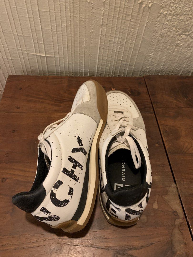 Givenchy GIV 1 Runner White Black Sneakers Size 40 (Category: Sneakers) located in Makati City. Submitted by movingpeach (Listing ID 1467230945, Image 1). Description: - Brand: Givenchy - Model: GIV 1 Low-Top Sneakers - Colorway: White leather with black branding, paint splatter details, and grey suede toe overlays - Soles: Durable gum rubber soles - Interior: Black lining with Givenchy logo insoles and 4G emblem prints - Inclusions: Comes with l