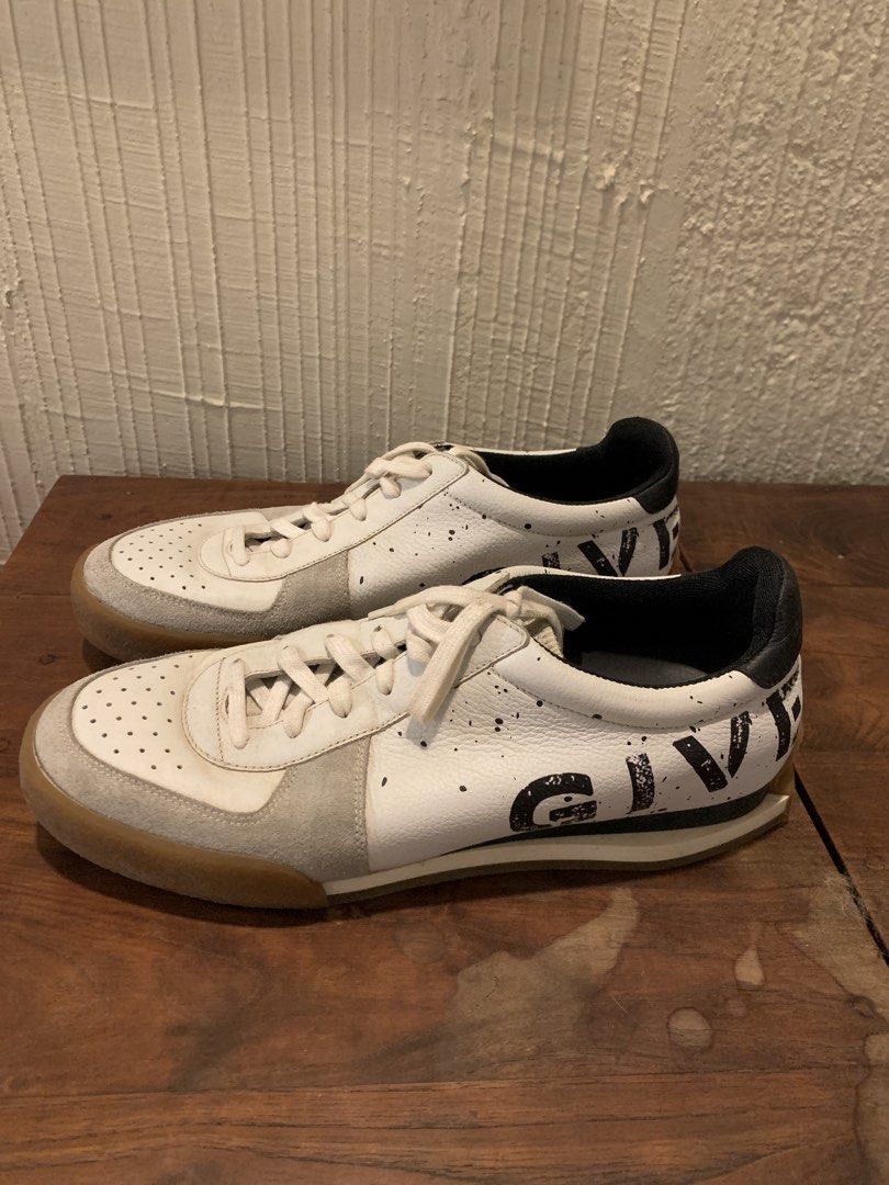 Givenchy GIV 1 Runner White Black Sneakers Size 40 (Category: Sneakers) located in Makati City. Submitted by movingpeach (Listing ID 1467230945, Image 2). Description: - Brand: Givenchy - Model: GIV 1 Low-Top Sneakers - Colorway: White leather with black branding, paint splatter details, and grey suede toe overlays - Soles: Durable gum rubber soles - Interior: Black lining with Givenchy logo insoles and 4G emblem prints - Inclusions: Comes with l