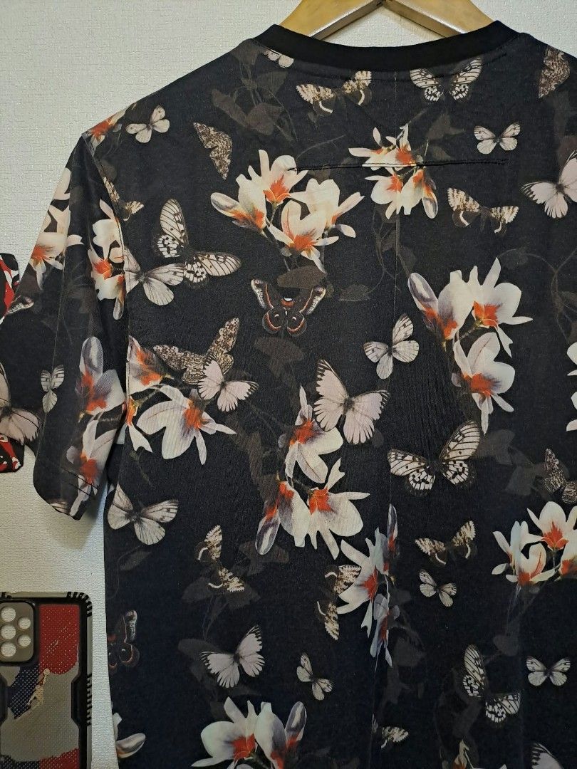 Givenchy Paris Floral & Butterfly (Category: Luxury Apparel) located in Quezon City. Submitted by yaseen73 (Listing ID 1467273736, Image 3). Description: Authentic Givenchy Paris Floral & Butterfly Print All Over Pattern pf White and Pale Peach Orchids Intermixed With Monochrome Butterflies on a Stark Black Backdrop. Made in Portugal - 100% Cotton - Wearing Size : XL on Tag - Width '20 - Length '28 - Color Rate 9.5/10 - Needs Wash - In Excellent 