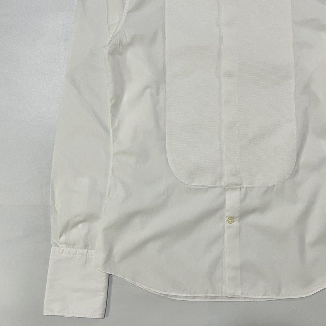 GIVENCHY POPLIN BIB TUXEDO SHIRT (Category: Luxury Apparel) located in Bacolod City. Submitted by the.finest (Listing ID 1467354802, Image 3). Description: Givenchy Poplin bib Tuxedo Shirt Open Cuffs Tag Size: 39 Width: 19 Length: 29 Condition: 9.5/10 6,000+shipping fee.