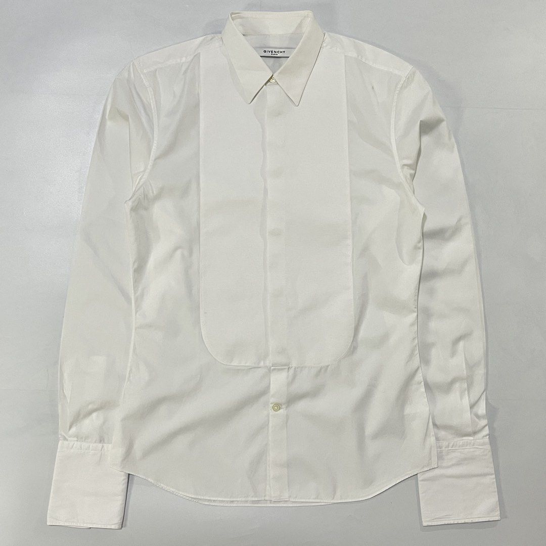 GIVENCHY POPLIN BIB TUXEDO SHIRT (Category: Luxury Apparel) located in Bacolod City. Submitted by the.finest (Listing ID 1467354802, Image 1). Description: Givenchy Poplin bib Tuxedo Shirt Open Cuffs Tag Size: 39 Width: 19 Length: 29 Condition: 9.5/10 6,000+shipping fee.