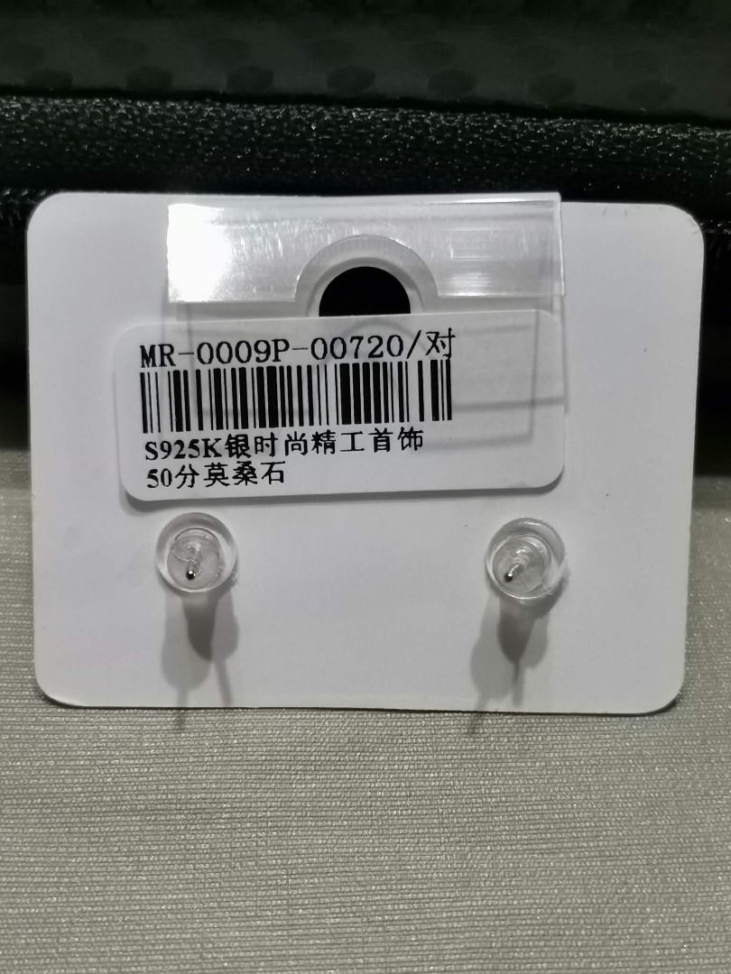 GME23 Green Moissanite Stud Silver Earrings (Category: Earrings) located in Cavite. Submitted by falconsclawset (Listing ID 1467321736, Image 2). Description: - Material: Genuine Silver S925 - Stone: Moissanite (0.50 carat / 50 points each) with brilliant sparkle - Setting: Classic, secure six-prong design - Condition: Brand new, unworn, comes on original retail card - Backing: Standard butterfly backs included - Style: Versatile and simple, perf