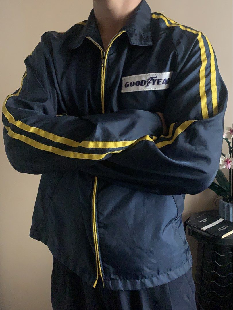 Goodyear Racing Track Jacket Navy Blue Yellow (Category: Coats, Jackets and Outerwear) located in Antipolo. Submitted by wan_thing (Listing ID 1467228600, Image 2). Description: - Regular fit - Fits small to medium - Unisex - Width: 22” height: 25” - Goodyear patch stitched on the left chest - Features: Classic fold-down collar, front zip closure, and two side pockets - Material: Lightweight and easy to layer over t-shirts or hoodies .