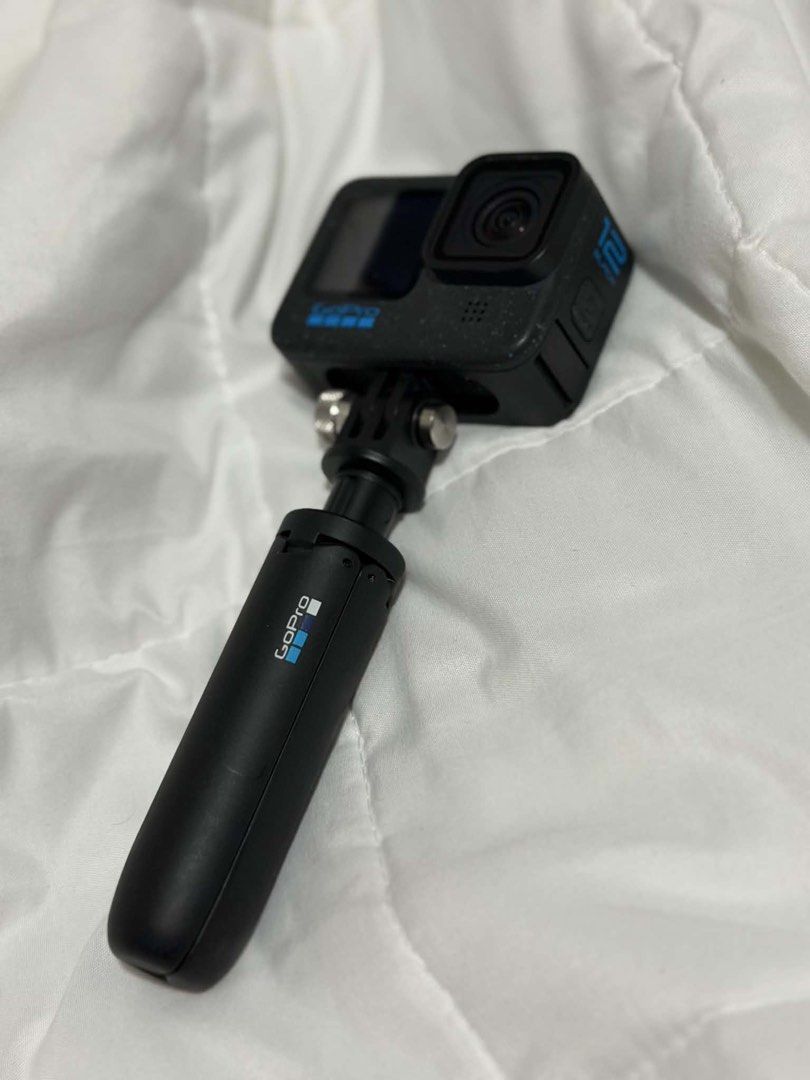 GoPro Hero 12 Black Bundle with Case and Mounts (Category: Video Cameras) located in Calamba. Submitted by docdf (Listing ID 1467314667, Image 2). Description: - GoPro Hero 12 Black ready-to-shoot bundle - Includes protective housing case, mini tripod handle, and floating hand grip - Comes with curved adhesive mounts with 3M tape - Includes a sturdy hard carrying case that fits everything - Ideal for travel, sports, and daily vlogging.