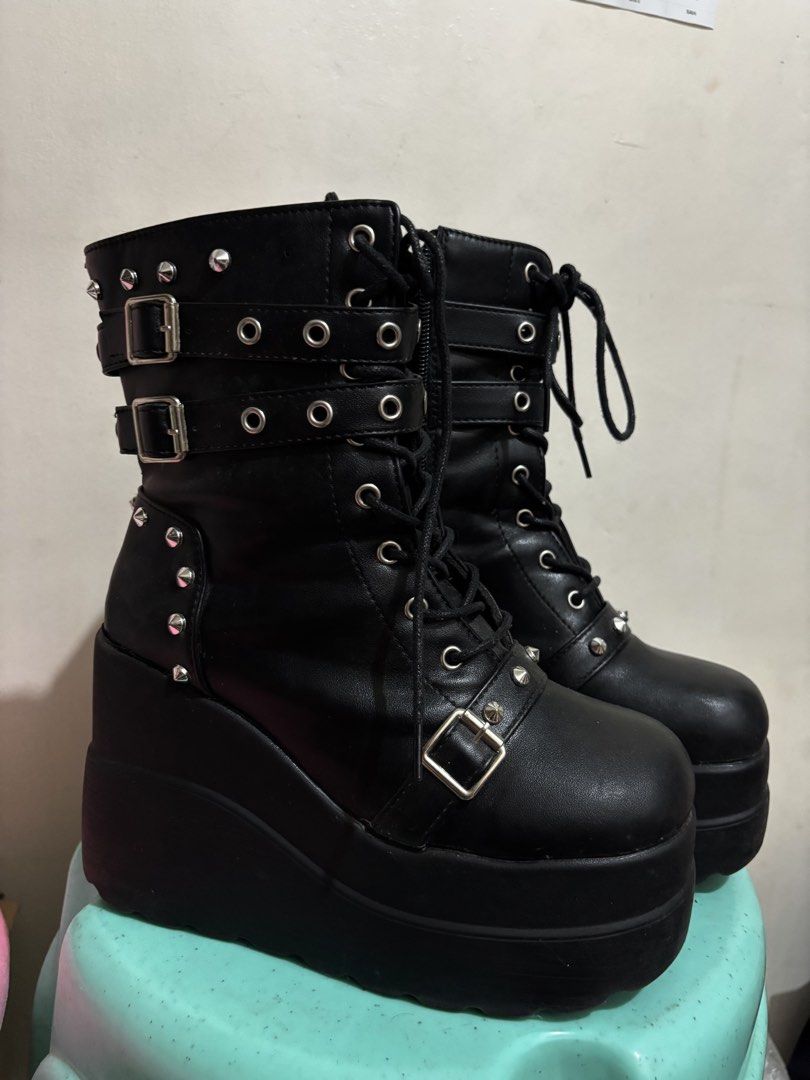 Gothic Punk Platform Wedge Boots (Category: Boots) located in Baguio. Submitted by nikonikonik (Listing ID 1467246220, Image 1). Description: ୨ৎ Selling my black chunky platform combat boots! ✧ Used for only 2 months ✧ Style: Gothic / alt / grunge ✧ Thick platform sole ✧ Lace-up design with multiple buckle straps Orig price: ₱1,200 💸 Price: ₱650 📦 MOP: GCash / Cash RFS: decluttering my wardrobe! Still a cute statement piece for your alt fits, e