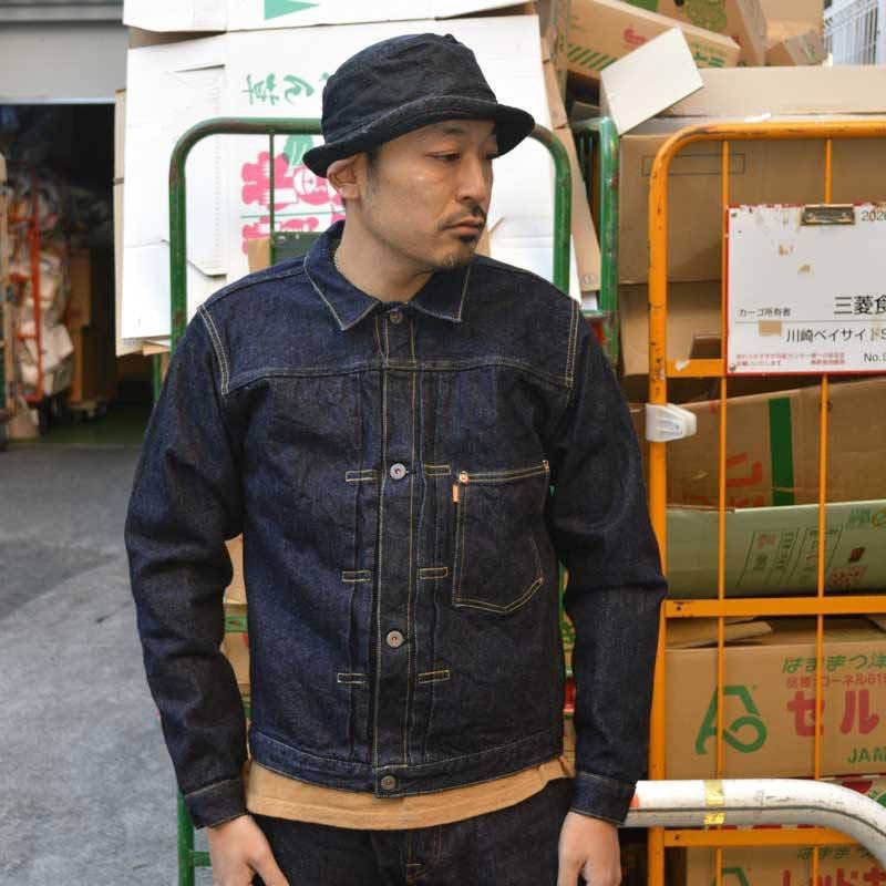 GraphZero 16oz Right Hand Twill Selvedge Denim Jacket (Category: Coats, Jackets and Outerwear) located in Manila. Submitted by limsanity03 (Listing ID 1467252297, Image 2). Description: - Brand: Graph Zero - Material: 16oz heavy texture right hand twill raw denim - Color: Deep indigo shade - Details: Single chest pocket with orange tab, pleated front, and cinch back buckle strap - Condition: Brand new with original store tag attached - Origin: Pr