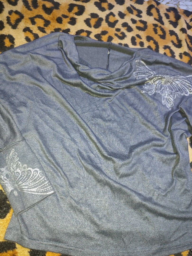 Gray grunge butterfly long sleeves top (Category: Longsleeves) located in Manila. Submitted by roze_0126 (Listing ID 1467298555, Image 2). Description: Decluttering clothes sale ✨ all in very good condition, need lang ng space sa wardrobe and funds for univ 🙌🏻 Loc: Manila pm for more information 🫡.