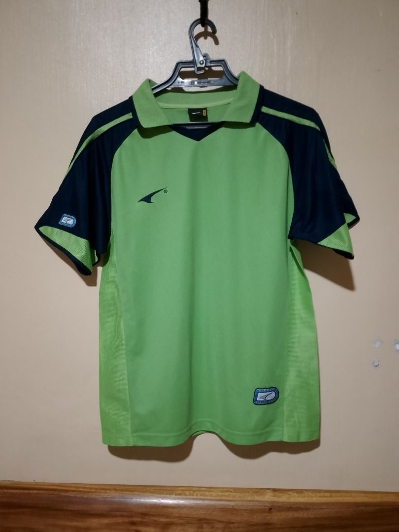 Green Navy Raglan Blue Athletic Jersey Polo (Category: Tshirts & Polo Shirts ) located in Bayombong. Submitted by daily10 (Listing ID 1467362049, Image 1). Description: - Dimensions: 20" x 26" - Color: Green and navy blue - Size: L (165/90) Fits M - Design: Pointed collar, V-neckline, and short sleeves - Features: Breathable mesh side panels and textured fabric - Details: Small embroidered logo on the right chest and sleeve patch -All Items are t