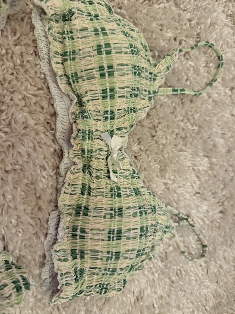 Green Plaid Smocked Bikini Set with White Bows (Category: Bikinis & Swimsuits) located in Mandaluyong City. Submitted by riz_040521 (Listing ID 1467207881, Image 2). Description: Worn once!! - Style: Green and white plaid two-piece swimsuit - Material: Super stretchy smocked fabric, fully lined - Top: Thin straps with a centered white bow - Bottoms: High-cut legs, cheeky coverage, and matching white bow - Fit & Use: Comfortable fit, perfect for b