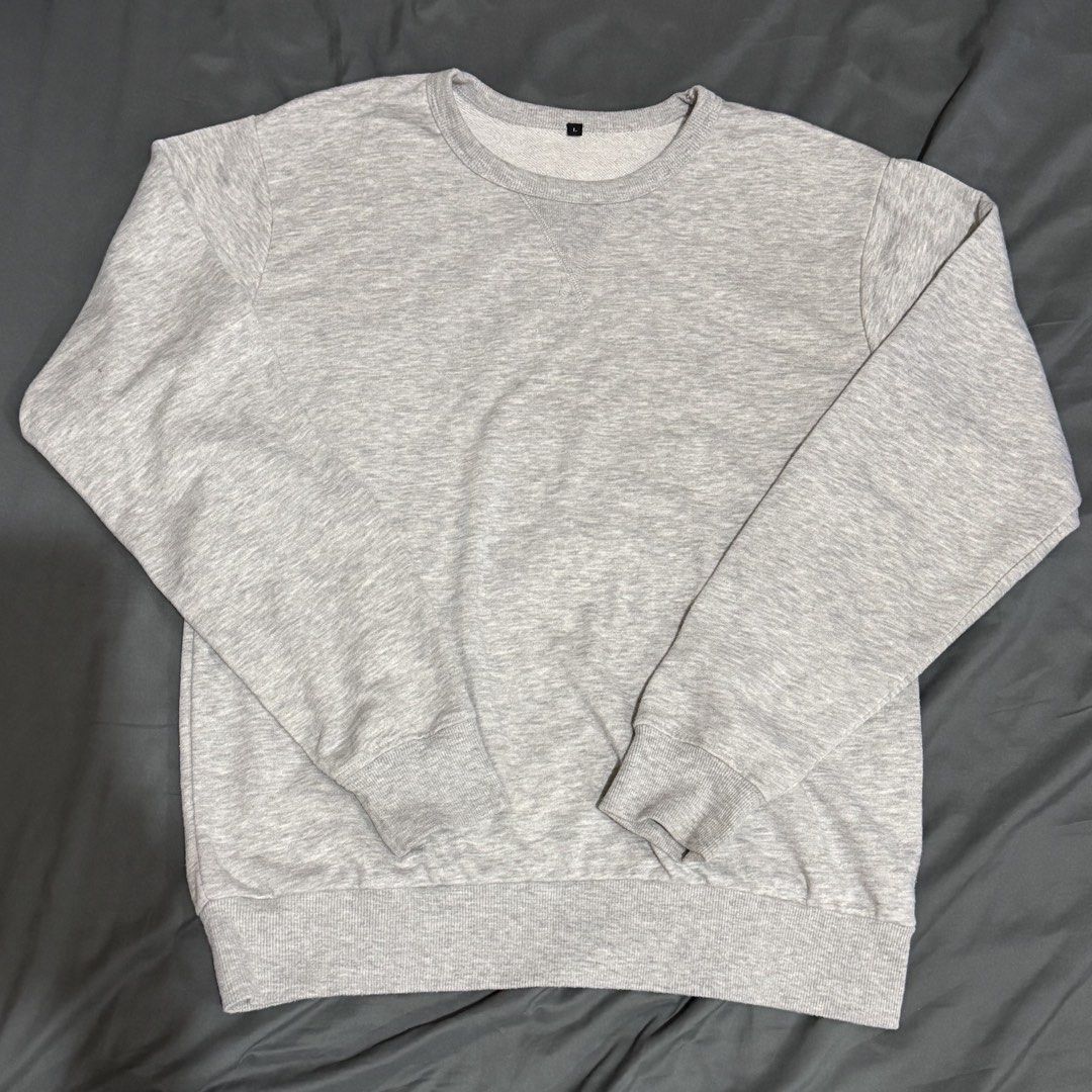 Grey Crewneck Sweatshirt Size Large L (Category: Coats, Jackets and Outerwear) located in Bocaue. Submitted by pat.staines (Listing ID 1467219172, Image 1). Description: - Color: Grey - Size: L - no issue Loc: Bocaue, Bulacan.