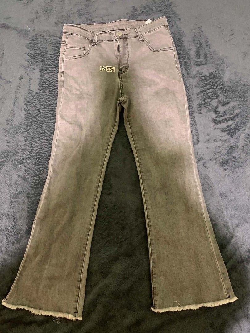 Grey Raw Hem Flare Jeans Size 27 (Category: Jeans) located in Manila. Submitted by quishi061210 (Listing ID 1467203121, Image 1). Description: - Grey flare jeans with trendy raw frayed hems - Size: 27 (160/66A) - Mid to high rise fit for a flattering silhouette - Functional front and back pockets - Secure button closure and zip fly - Comfortable cotton blend material - Cool washed style with faded coloring throughout.