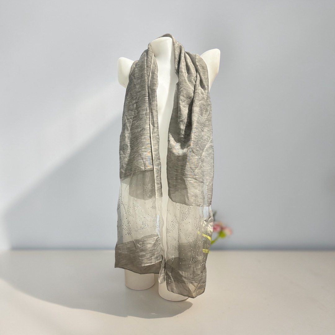 Grey Scarf with Sheer Panel and Rhinestone Accents (Category: Scarves) located in Santa Cruz. Submitted by homedecluttersale (Listing ID 1467355456, Image 1). Description: • Bought in Japan 🇯🇵 • Brand new / Unused • Excellent condition • Photos taken using mannequin only 🚚 Shipping via J&T only 📦 Shipping fee to be shouldered by buyer 💳 Mode of payment: GCash 📍 Santa Cruz, Laguna.