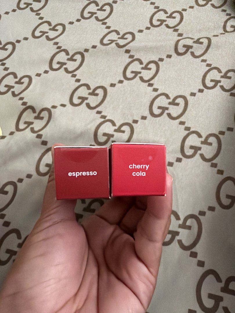 GRWM Cosmetics Dewy Lasting Tint Espresso & Cherry Cola (Category: Makeup) located in Calamba. Submitted by fairmabs (Listing ID 1467212331, Image 2). Description: - Brand: GRWM Cosmetics - Product: Dewy Lasting Tint (Glossy lip stain formula) - Quantity: 2 boxes - Shades: Espresso and Cherry Cola - Condition: Brand new, unopened, and sealed - RFS: Decluttering / Extra stocks.