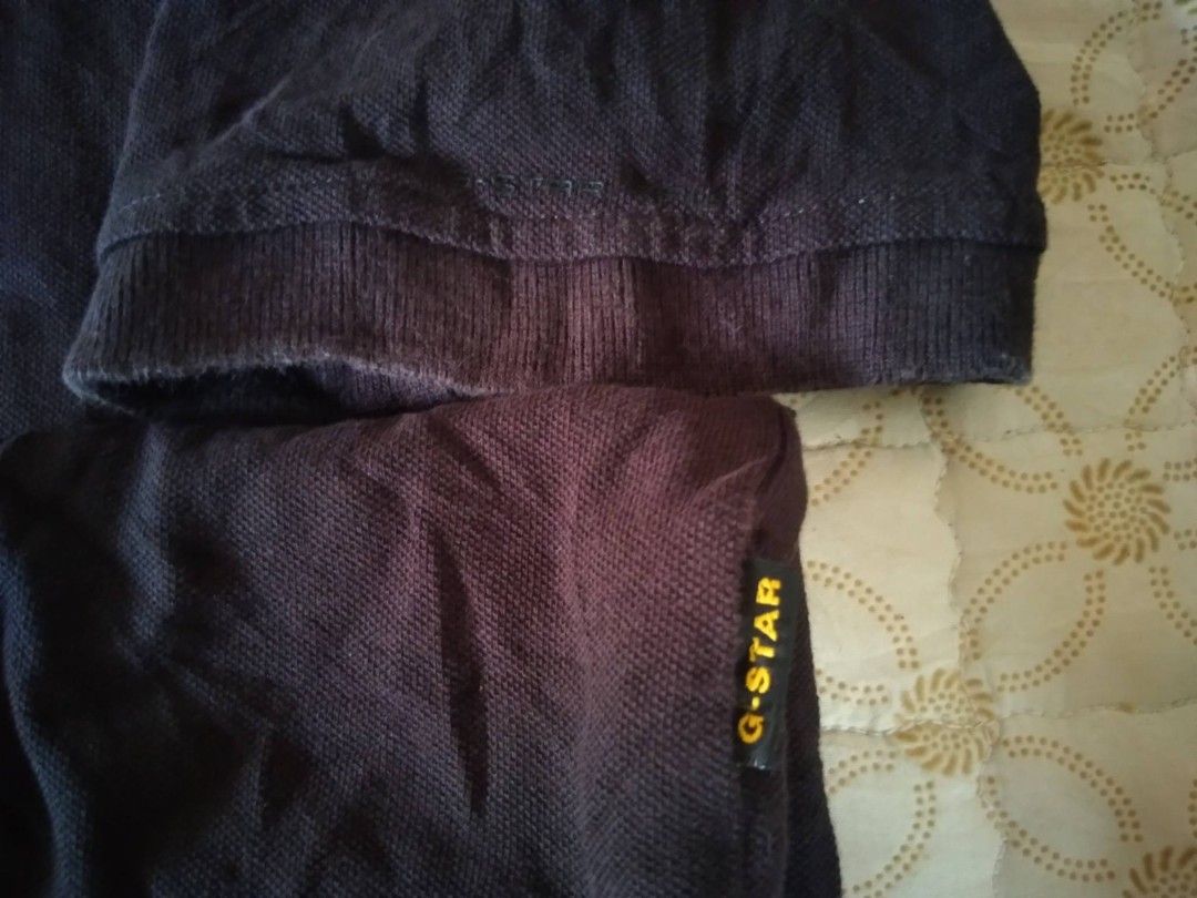 G-Star Raw Polo Shirt Dark Blue Medium (Category: Tshirts & Polo Shirts ) located in Zamboanga. Submitted by nurbya898048 (Listing ID 1467252096, Image 3). Description: G-Star Raw Raw Sports polo shirt in black. Size medium. Large embroidered G.S. Raw logo on the chest. Classic collar with three-button placket and contrasting blue inner taping. Small branded tag on the sleeve hem. RN 104506, CA 41169. Comfortable cotton knit material, great casua