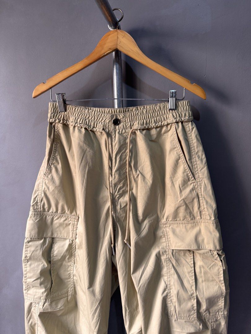 GU - Wide cargo Parachute Pants (Category: Activewear) located in Cabuyao City. Submitted by _streetflavor (Listing ID 1467229345, Image 2). Description: GU - Wide cargo Parachute Pants Excellent Size: Small fits 30-32 Length: 39 Leg open: 12.5 ‘adjustable’ -1,280 pesos Dm.