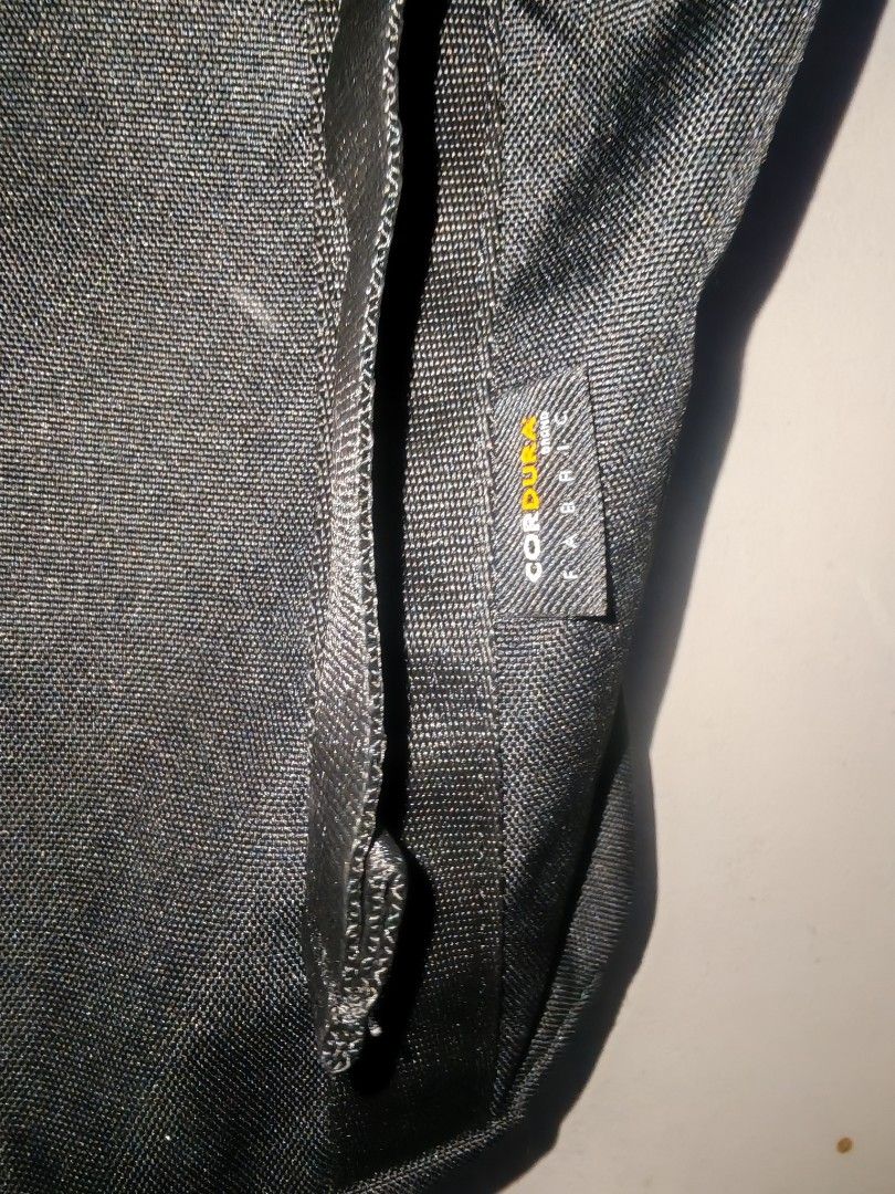 GU Cordura Fabric Black Backpack (Category: Backpacks) located in Iriga City. Submitted by aldwinpawl (Listing ID 1467176480, Image 2). Description: - Brand: GU - Material: Durable Cordura fabric (100% polyester) - Color: Black - Size: One Size - Design: Roll-top with secure buckle closures and adjustable straps - Condition: Clean overall - Features: Spacious interior, perfect for daily commuting or school use.