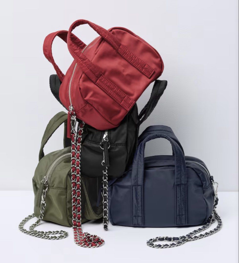 GU NYLON MINI BOSTON BAG (Category: Cross-body Bags) located in Quezon City. Submitted by cai_wong (Listing ID 1467315490, Image 2). Description: .