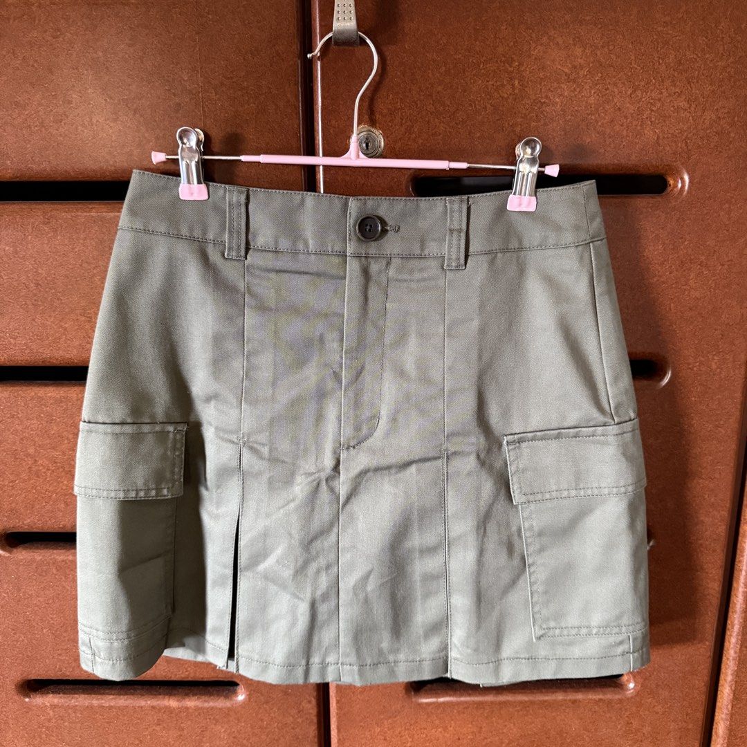 GU Olive Green Cargo Skirt Size M (Category: Skirts) located in Davao. Submitted by keirousel (Listing ID 1467296465, Image 1). Description: - Can be bundled with any item on my listing - Size 28 M - Brand: GU - Color: Olive green - Style: Utility skirt with front button closure and belt loops (no shorts) - Pockets: Functional side cargo pockets - Material: Comfortable cotton and polyester blend - Versatility: Easy to style with casual tees or ta