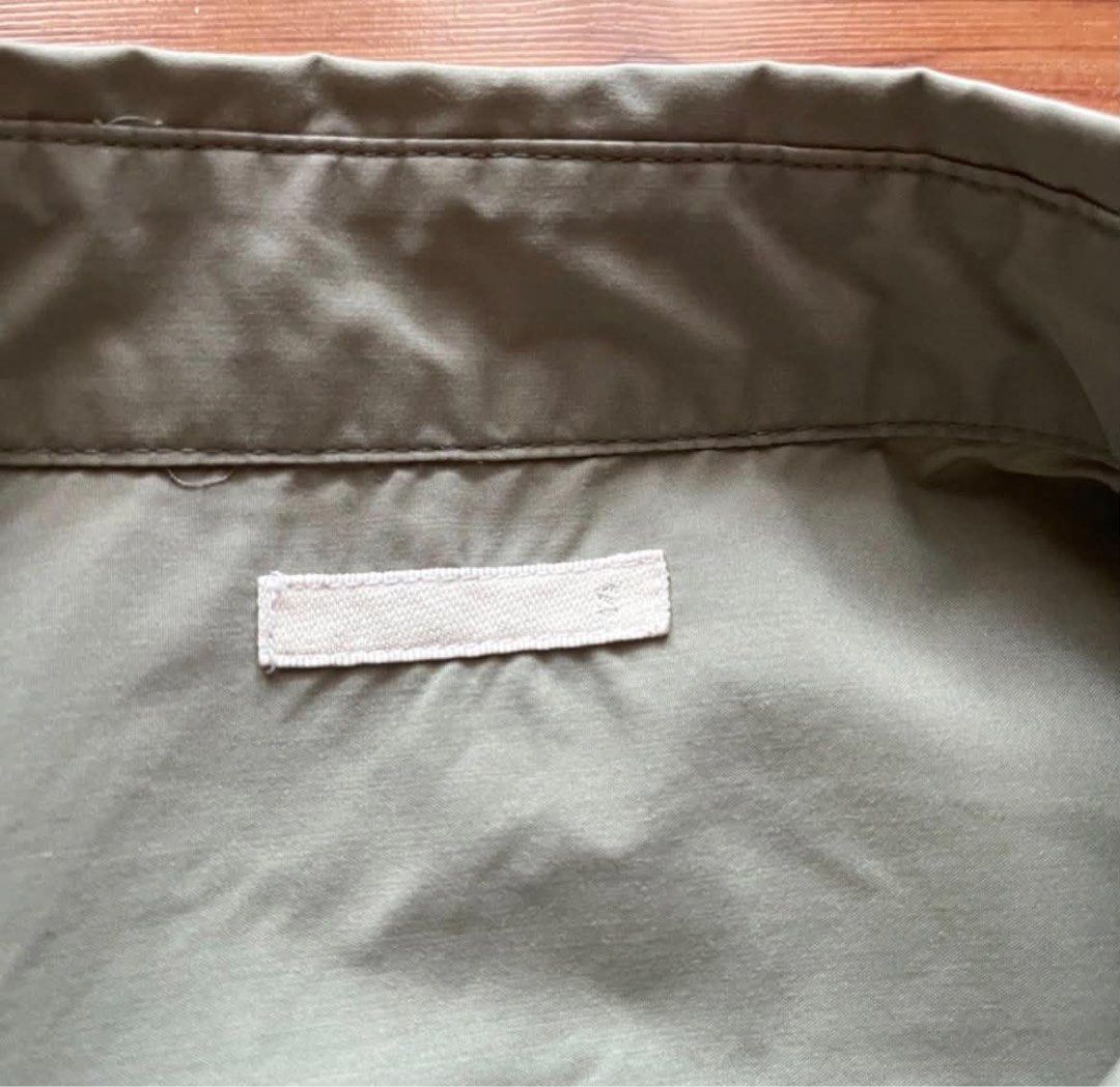 GU polo shirt (Category: Tshirts & Polo Shirts ) located in Rizal. Submitted by timelessfinds89_ (Listing ID 1467318532, Image 2). Description: - Color: Sage green - Size: Small (S) - Material: Lightweight cotton-blend - Design: Classic collar, front button placket, matching buttons - Details: Single left chest pocket, curved hemline - Fit: Versatile for both tucked and untucked looks - Condition: Clean piece, neutral tone that goes with everythi