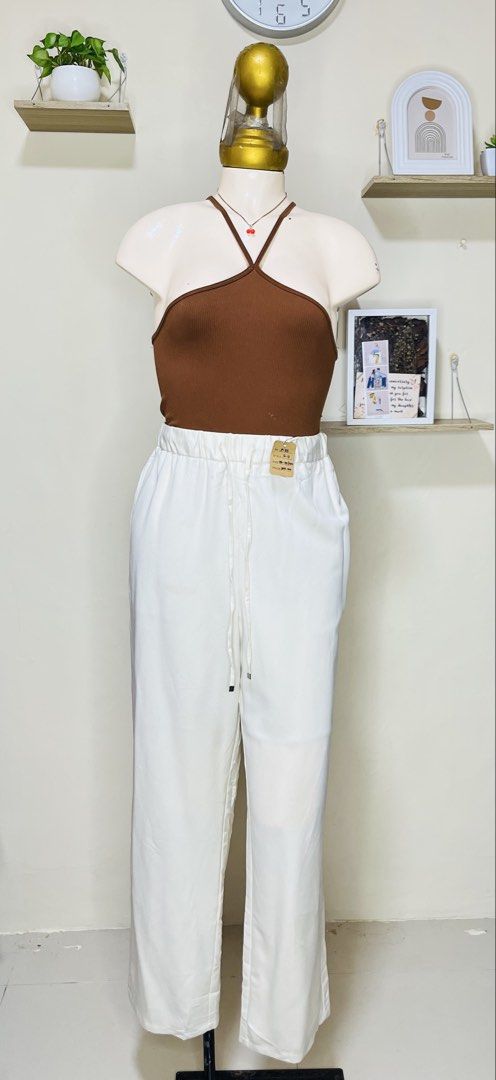 GU White Drawstring Wide Leg Pants Size XL (Category: Other Bottoms) located in Manila. Submitted by bengirlclothing (Listing ID 1467176212, Image 1). Description: - Brand: GU - Size: 28-32 inches -Length: 40 inches - Color: White - Style: Wide leg, straight cut - Waist: Elastic waistband with drawstring front .