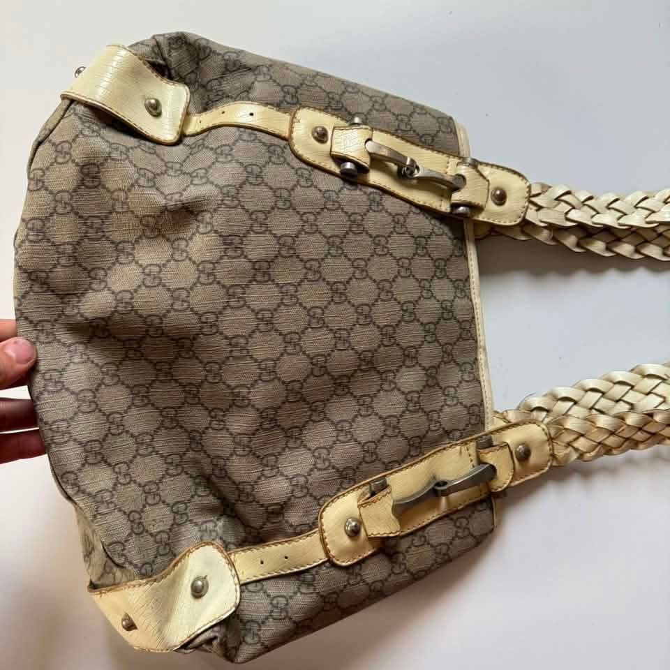 Gucci braided canvas bag (Category: Shoulder Bags) located in Iligan City. Submitted by vintgbags (Listing ID 1467177177, Image 2). Description: All details are posted Condition is Good. Open for negotiable sent your offer..
