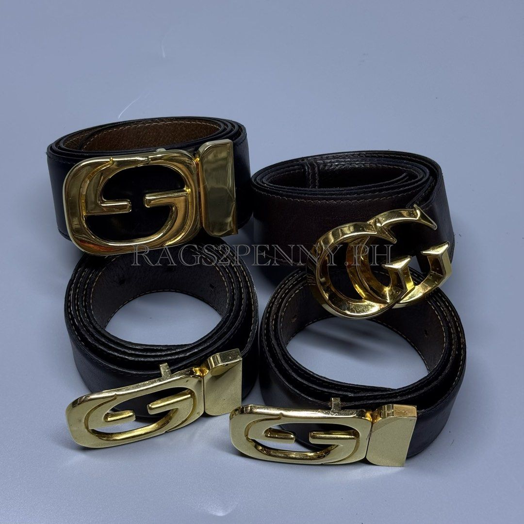 Gucci G-Buckle Leather Belts (Category: Luxury Accessories) located in Kabacan. Submitted by rags2penny.phl (Listing ID 1467225869, Image 1). Description: - Set of 4 authentic Gucci leather belts in classic black and dark brown - Genuine leather straps with premium visible grain texture - Gold-tone hardware featuring iconic interlocking G and single G buckles - Includes a variety of versatile buckle designs - Elevate any casual or formal outfit w