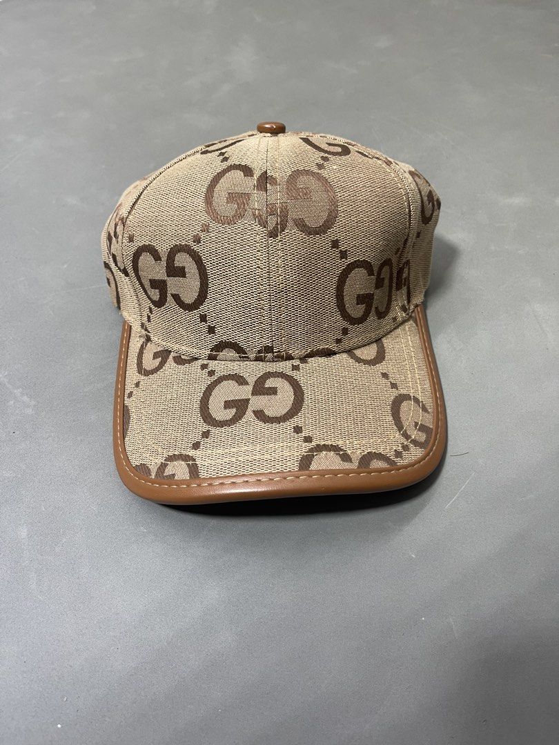 Gucci GG Canvas Baseball Cap Brown Beige (Category: Caps & Hats) located in Manila. Submitted by mine2ownit (Listing ID 1467287517, Image 1). Description: - Gucci baseball cap in classic brown and beige GG monogram canvas - Premium brown leather trim along the brim edge - Adjustable back strap with Gucci branding for a custom fit - Clean interior with branded lining ribbons and tags.